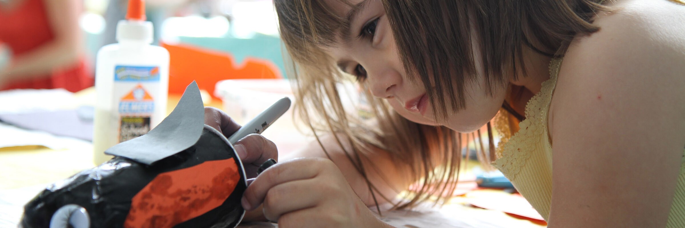 girl-making-paper-toy